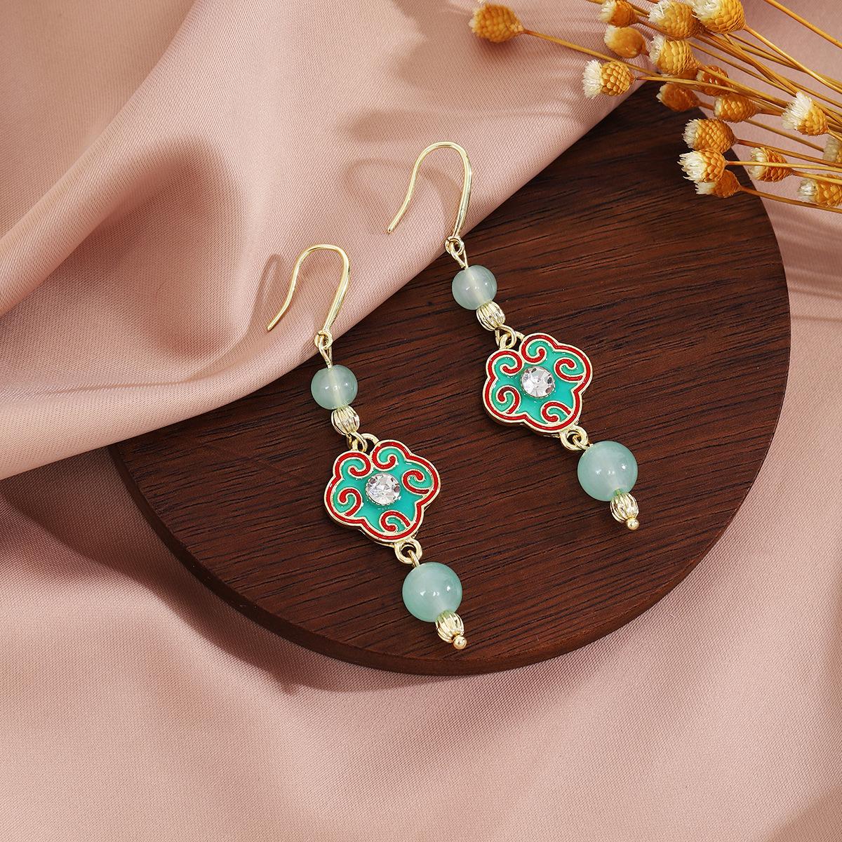 

Элегантные зеленые серьги-кисточки с эмалью и цирконом в виде благоприятного облака Жуи