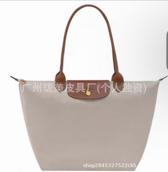 

Longxiang Zhou Tote Bag One Shoulder Crossbody Mommy Waterproof Nylon Tote Bag Embroidered Hand Carry Commuter Bag Short handle small size