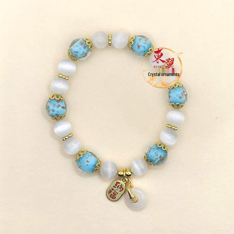 Blue Luminous Gold Sand & White Cat s Eye Stone Bracelet