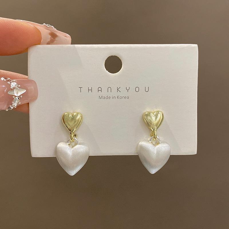 

S silver needle double love pearl earrings women s light luxury niche design high-end stud earrings simple temperament ear jewelry