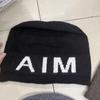 Contrasting large letters Elastic thin age reducing pile hat Children autumn and winter warm versatile Internet celebrity wool hat Knitted hat