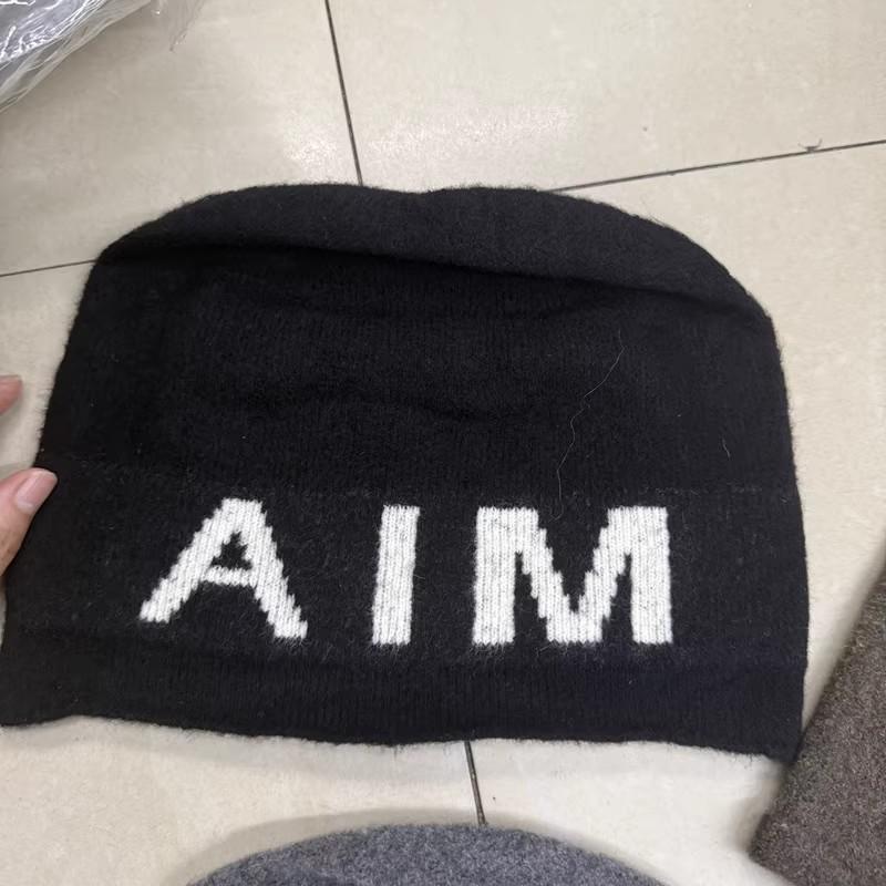 Contrasting large letters Elastic thin age reducing pile hat Children autumn and winter warm versatile Internet celebrity wool hat Knitted hat