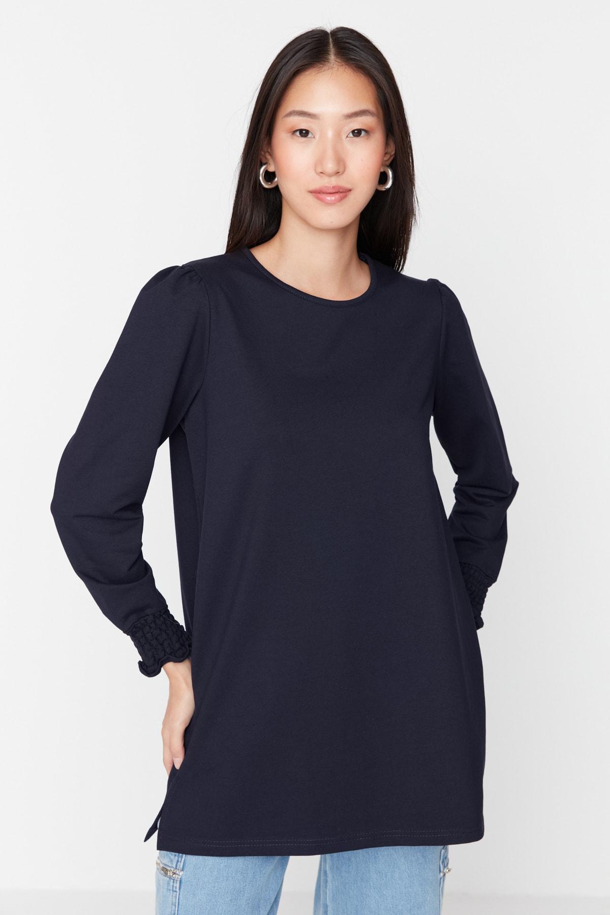 

Темно-синяя вязаная туника с манжетами TCTAW23UK00065..