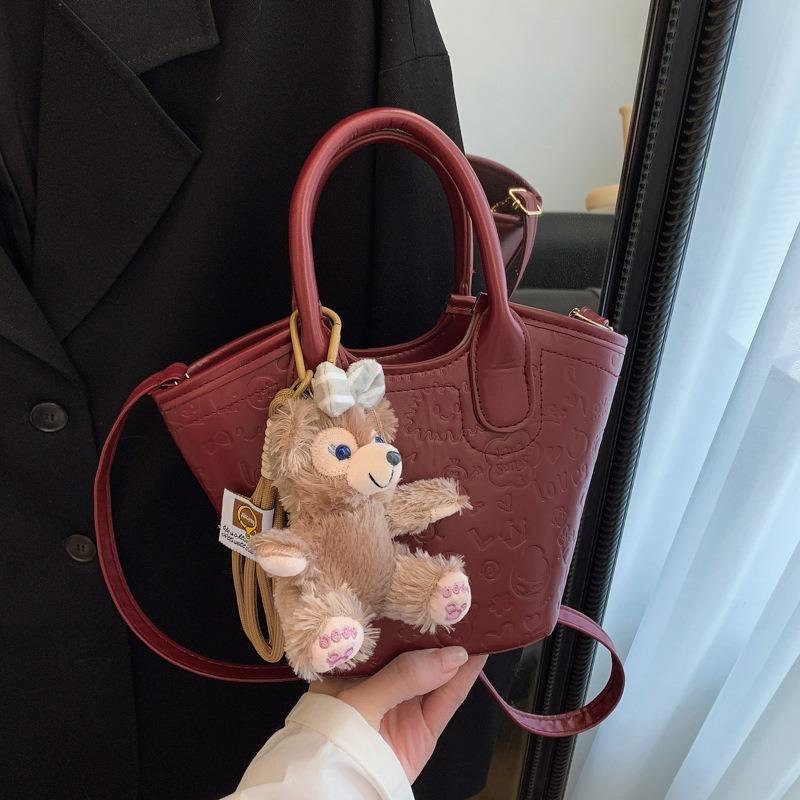 Summer Niche Embossed Bag Women's New Fashion Versatile Messenger Bag High-end Portable Bucket Bag