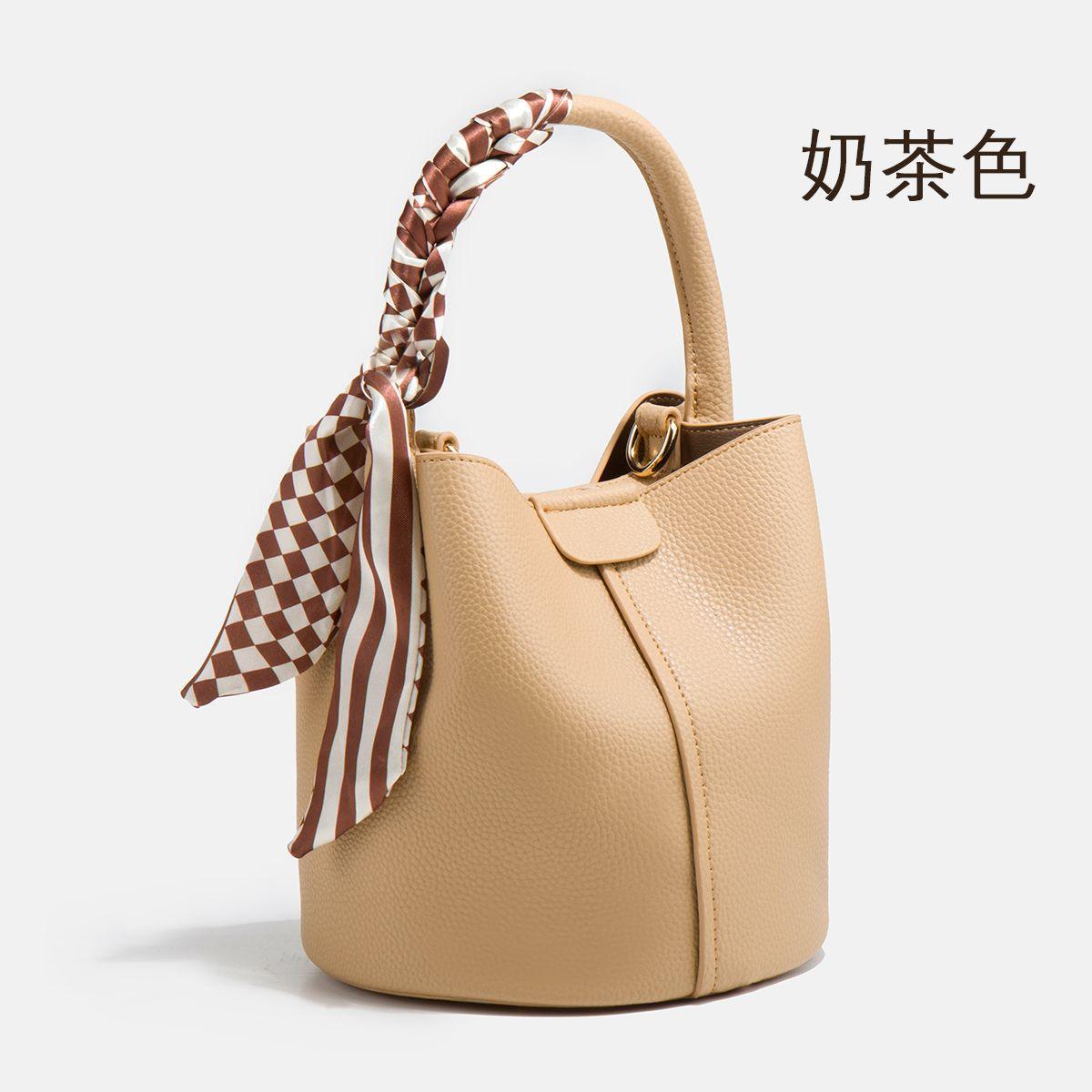 

Simple portable bucket bag women s 2025 summer new foreign style versatile work commute shoulder messenger bag