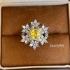 Luxurious and elegant ring featuring yellow diamond and six-flower cubic zirconia, plated with double gold, and featuring a square-shaped small