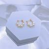 Natural freshwater pearl stud earrings, female silver needles, niche handmade design, simple and compact, high-end earrings, small fragrant style