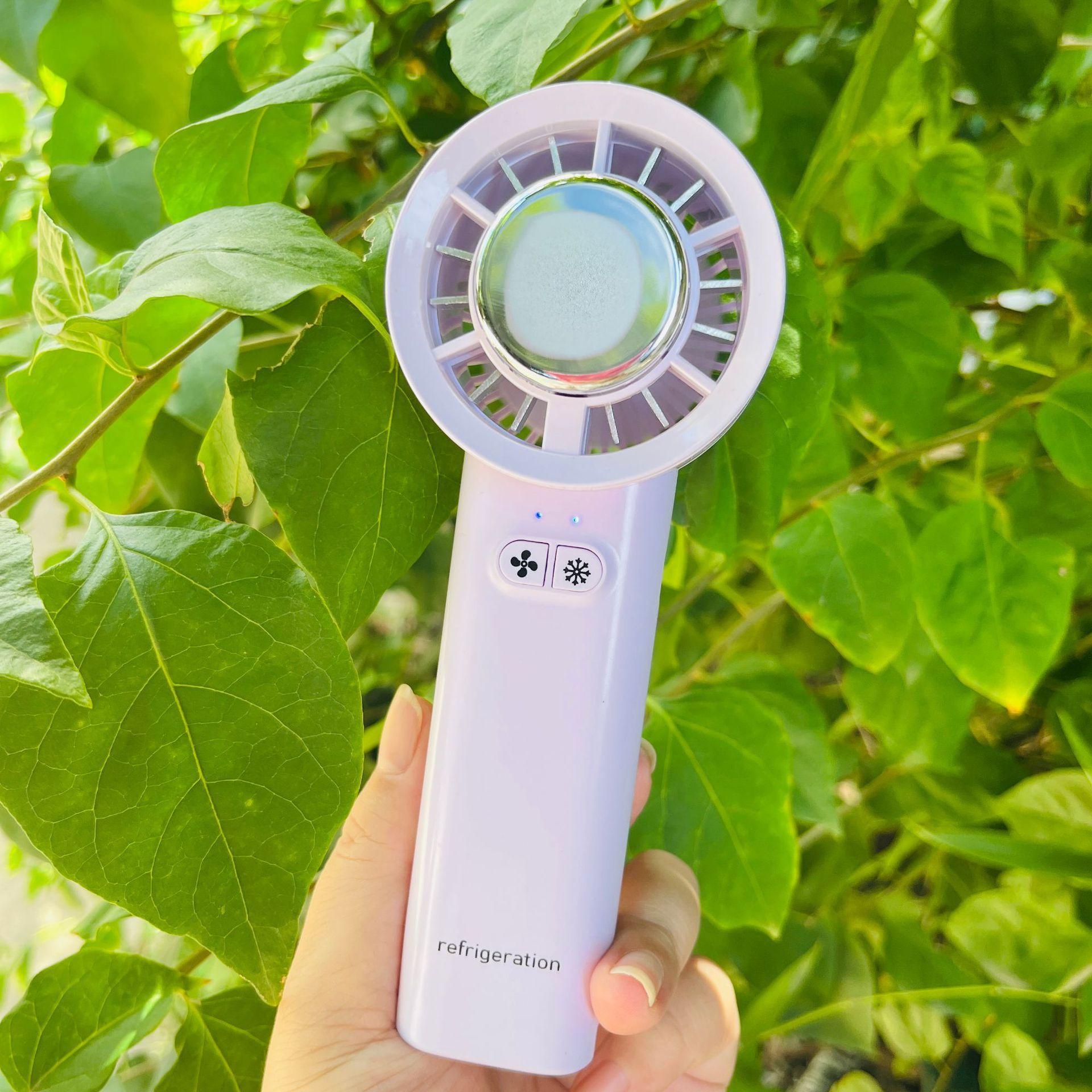 

Portable handheld air conditioner fan, instant cooling technology, 3 speed settings, USB rechargeable фіолетовий