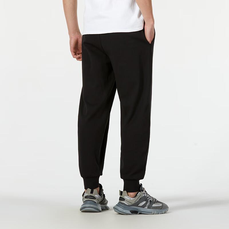 Puma Solid Color Elastic Waistband Tapered Knit Sports Pants Men Bottoms Black 682917-01