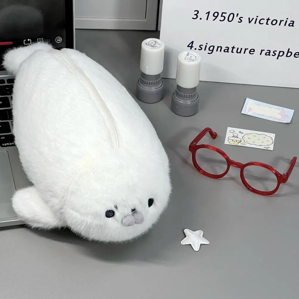 Case for stationery in the form of a cute seal, soft toy-frock, a gift to schoolchildren