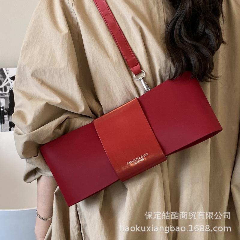 This year, the popular super hot small bag women's 2025 new fashion versatile messenger bag high-end bow armpit bag