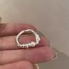 **Elegant Irregular Silver Pearl Ring for Women - Luxurious Niche Design**