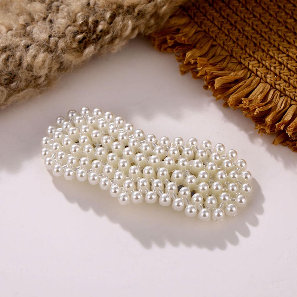 

Набор из 12 заколок для волос с жемчужными бусинами 10