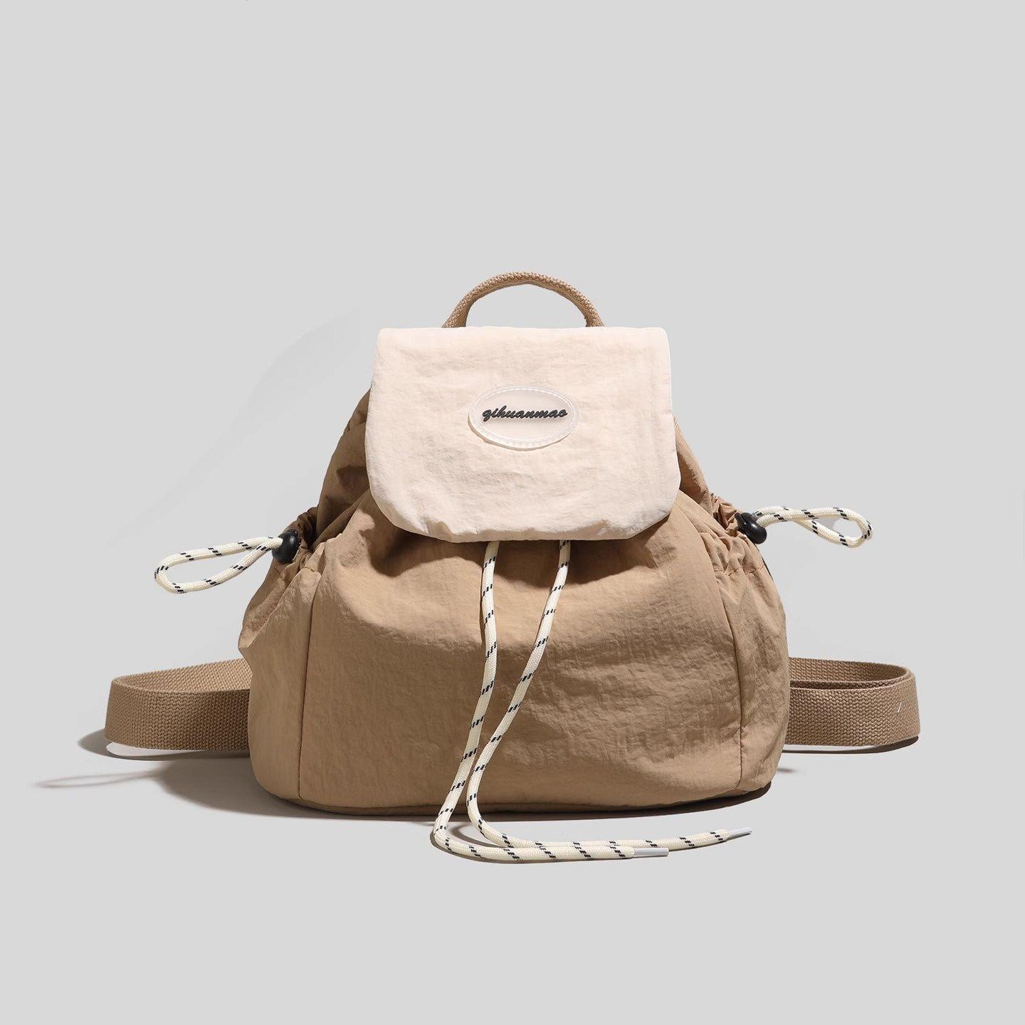 

2025 Универсальный женский дорожный и студенческий рюкзак: Легкий, Простой, Дизайн с кулиской хаки