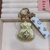 999 Fine Gold Lucky Money Bag Charm Keychain for Prosperity