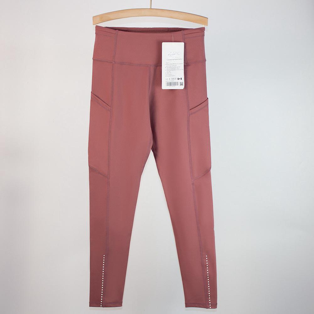 Women's High Waist Tummy Control Yoga Pants with Pockets - Tight Fit for Running, Cycling, and Outdoor Activities.