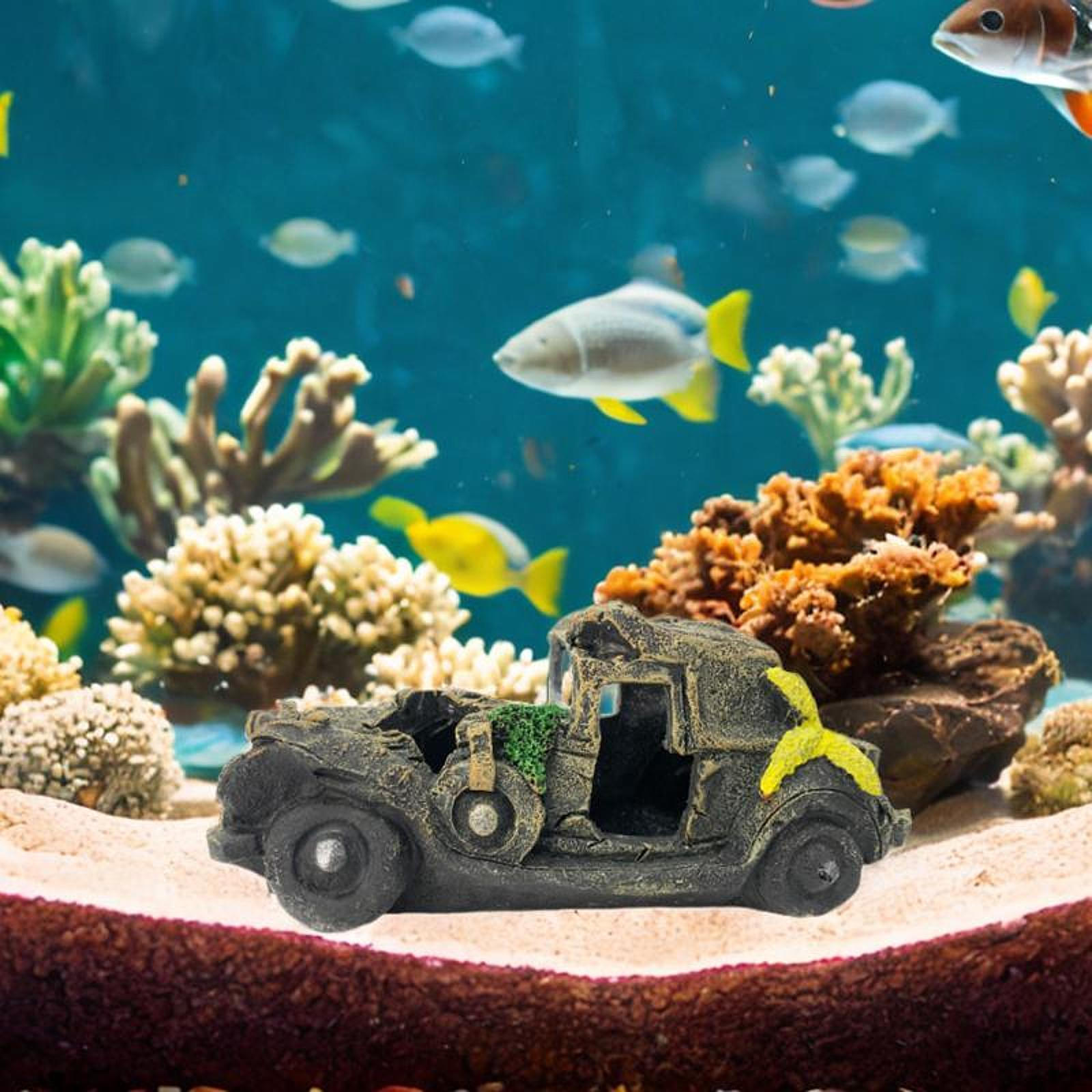

Прикраса акваріума, що включає автоаварій для водного середовища проживання Car