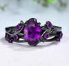 Bague bicolore noire et dorée avec zircon triangulaire vert olive