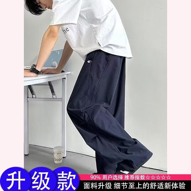 

Navy blue embroidered pants men s summer American retro drape wide-leg pants advanced pleated loose paratrooper pants 3XL Темно-синій