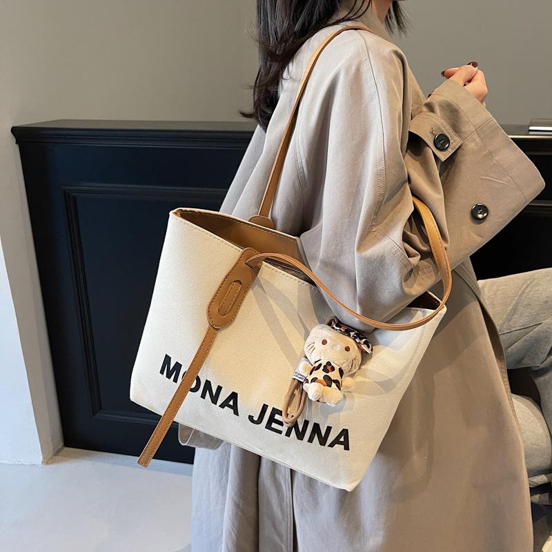 

Supply large-capacity canvas bags and women s bags 2025 new high-end textured handbags shoulder bags commuter bags 38*13*26