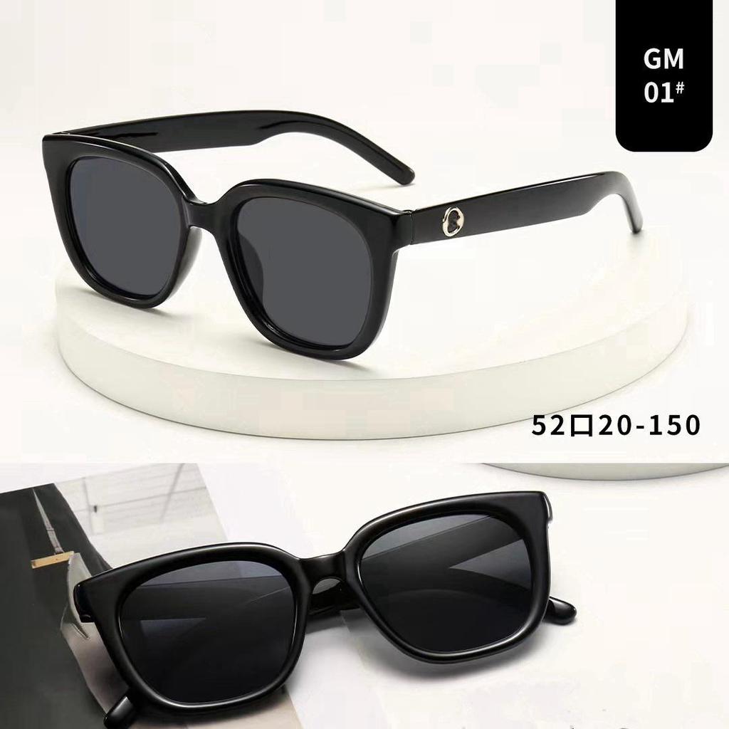 Gafas de sol elegantes de ojo de gato: Montura negra unisex, diseño adelgazante para rostros grandes, elegante protección solar.