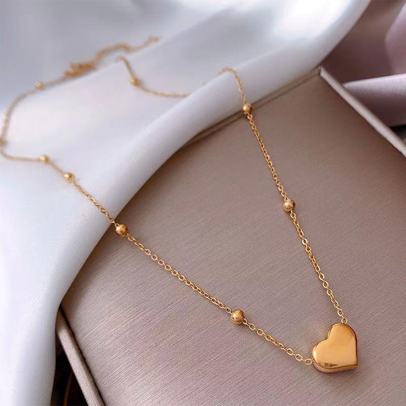 High-End Titanium Steel Colorfast Heart Necklace - Women's Versatile Clavicle Chain with Peach Heart Pendant