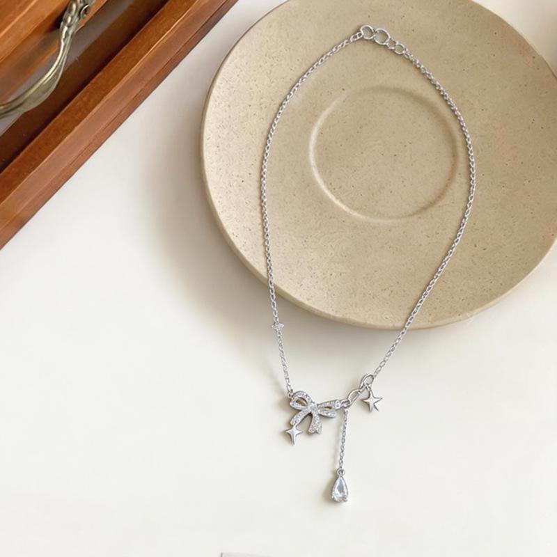 Elegant Zircon Bow & Water Drop Star Pendant Necklace - Fashionable Light Luxury Clavicle Chain for Women