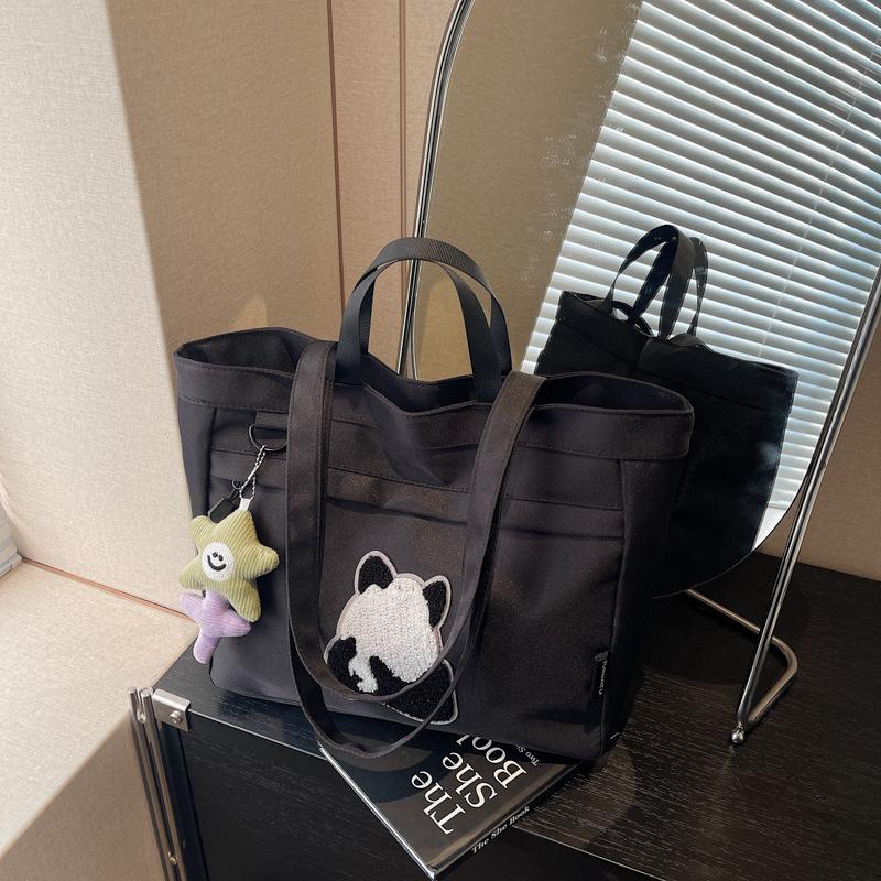 Casual large-capacity shoulder bag women's new fashion handheld cloth bag versatile class tote bag
