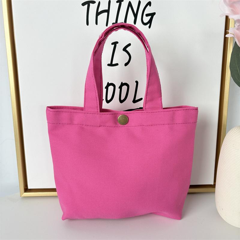 Effenkleurige eenvoudige lunchtas, draagbare canvas tas, kleine stoffen tas, draagbare canvas tas voor het opbergen van diverse spullen