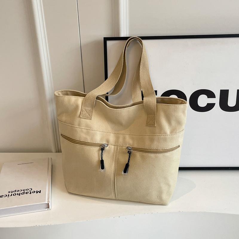 

Повсякденна жіноча дорожня сумка 2024 року проста портативна сумка на плече великої місткості, модна полотняна нова модна сумка-тоут хакі