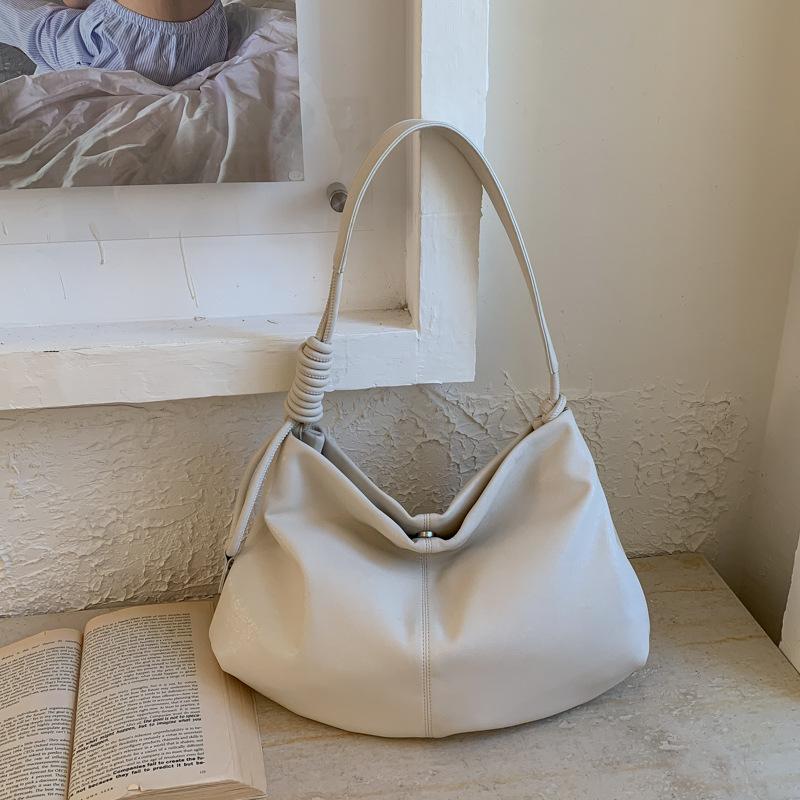 

Large capacity totes2026New Commuter Shoulder Crossbody Bag, Simple Women s Bag, Niche Soft Leather Dumpling Underarm Bag білий