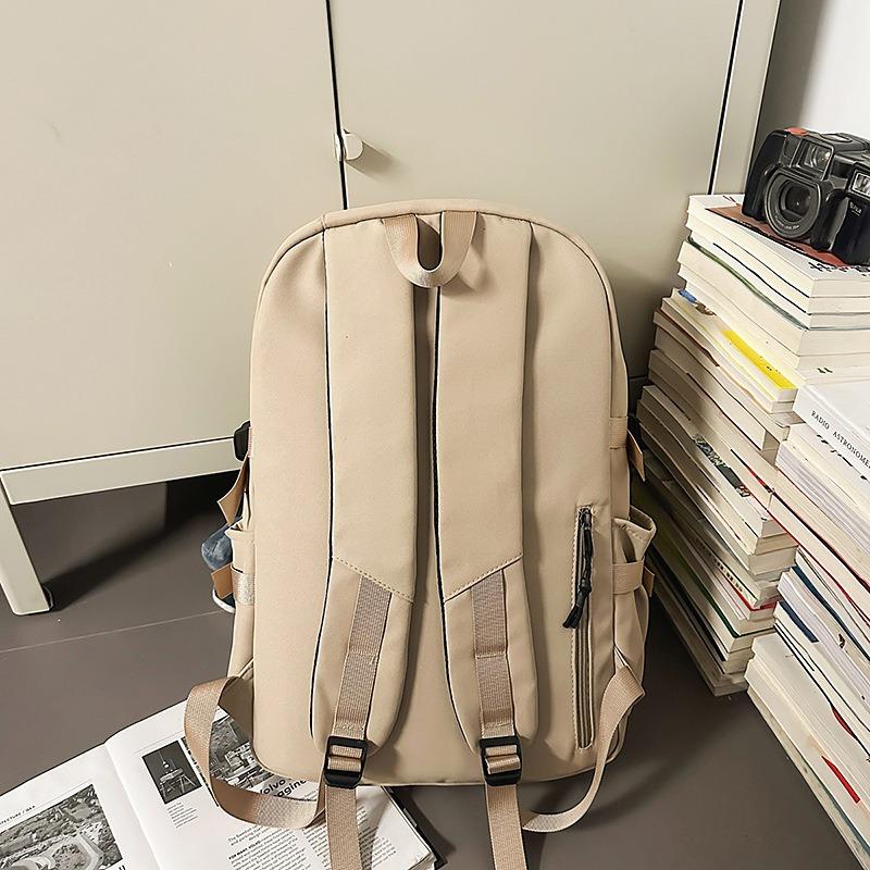 High value niche design backpack couple solid color simple lightweight large capacity backpack