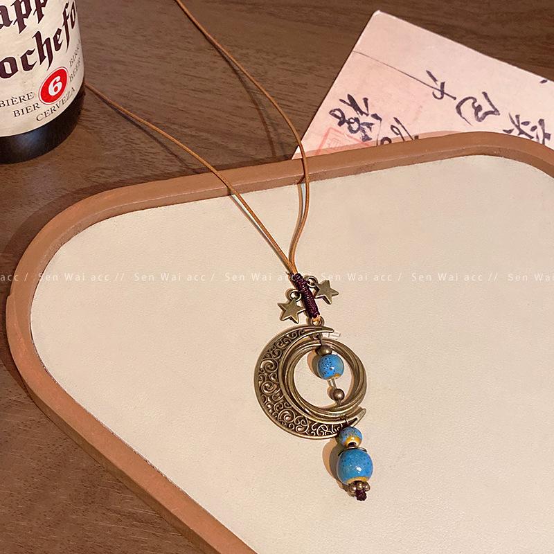 

New Chinese retro star and moon beaded necklace female personality Internet celebrity sweater chain new accessories
