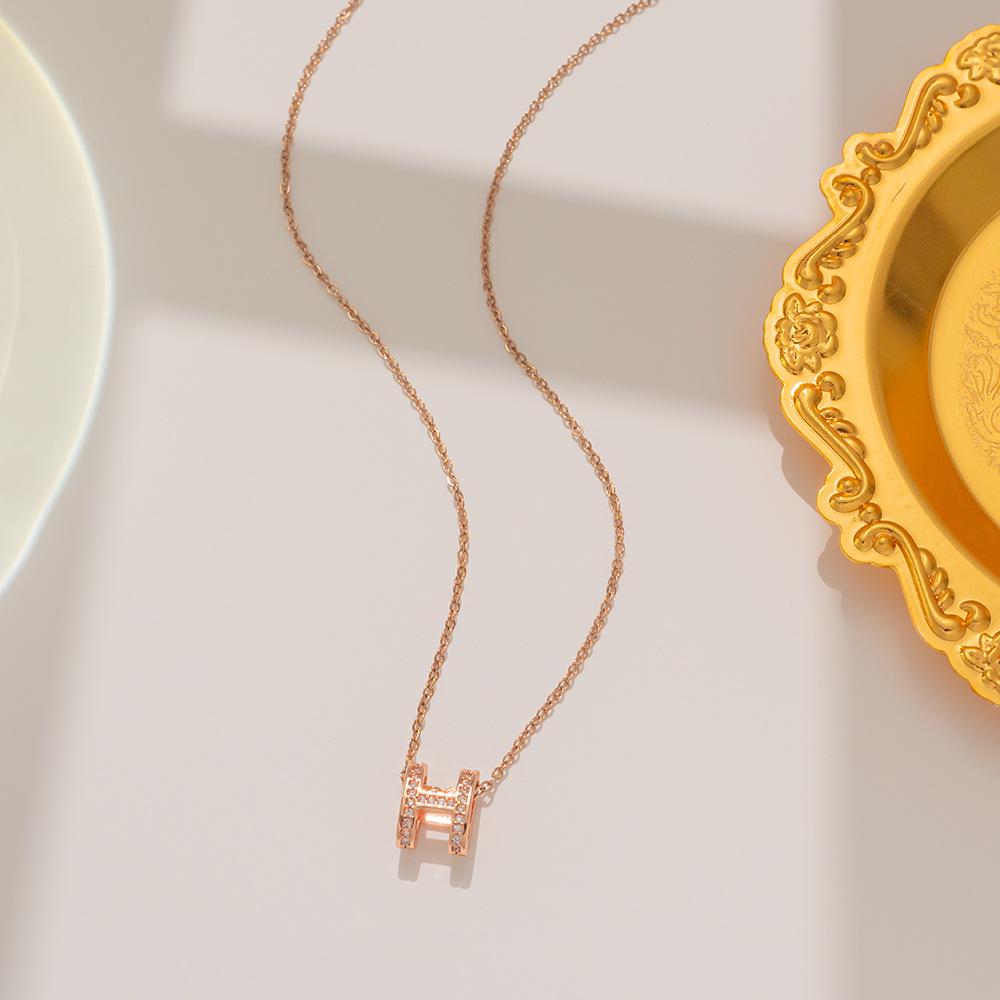 Elegant Colorfast 18K Rose Gold Necklace with Swan & Four-Leaf Clover Charm