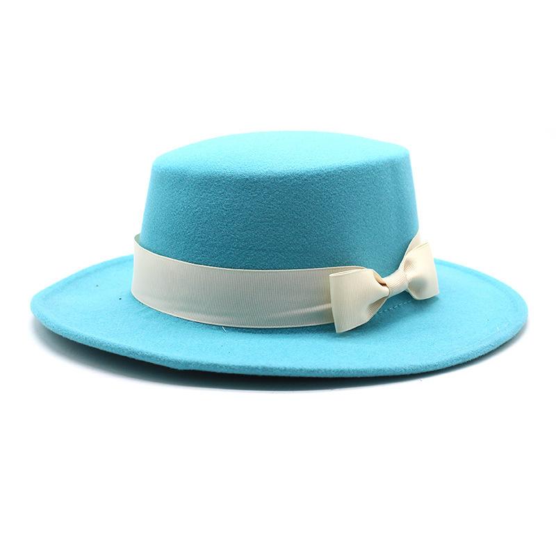 New style autumn and winter men's and women's flat-brimmed hats, fashion bows, flat-topped top hats, men's and women's woolen jazz hats