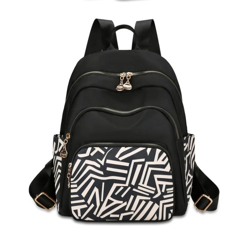 Batohy na zip z nylonu  Měkký zádový panel  Velká pevná kapacita  Vysoce kvalitní roztomilé školní batohy  Vnitřní přihrádka  Móda