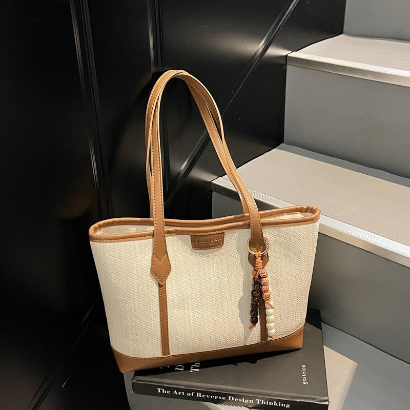 Retro large-capacity bag women's 2025 new niche high-end sense popular fashion shoulder bag commuter tote bag