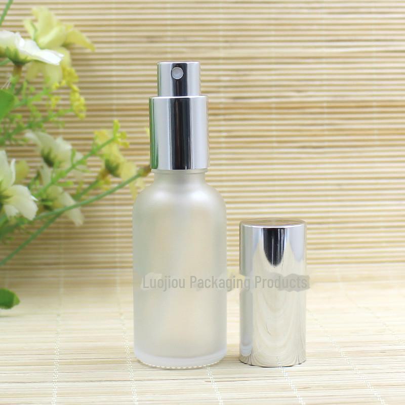 Frosted Glass Essential Oil Bottle with Silver Spray