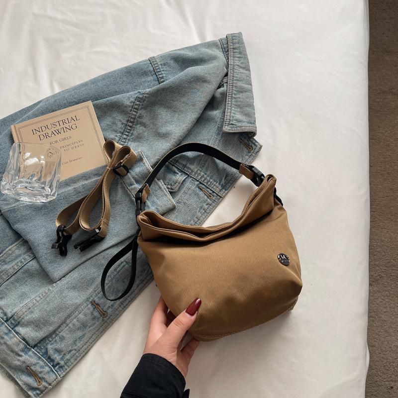

Super fire small cloth bag high sense niche versatile mobile phone bag simple fashion nylon lightweight messenger bag хаки