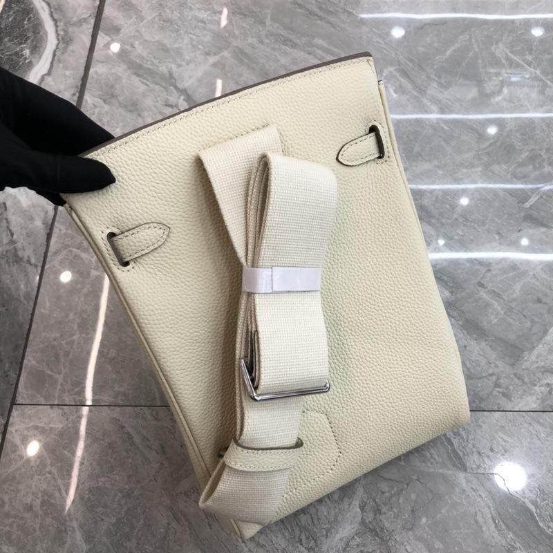 2025 New Leather Gender-neutral Men's and Women's Same First-layer Cowhide Round Lock Hole Breast Bag Single Shoulder  Leather Backpack