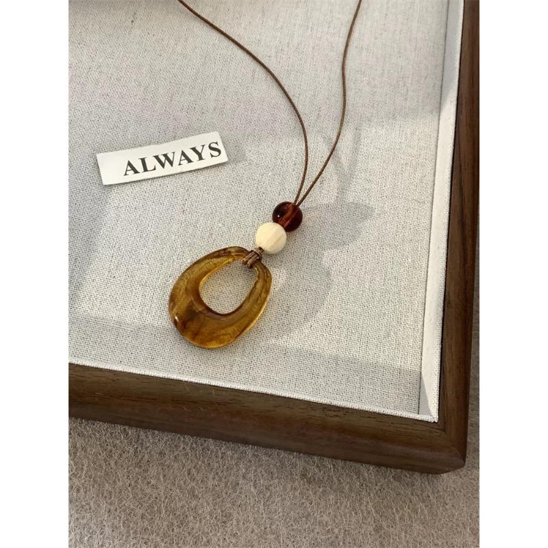 Vintage Ethnic Style Brown Hollow Geometric Circle Long Pendant Necklace For Women