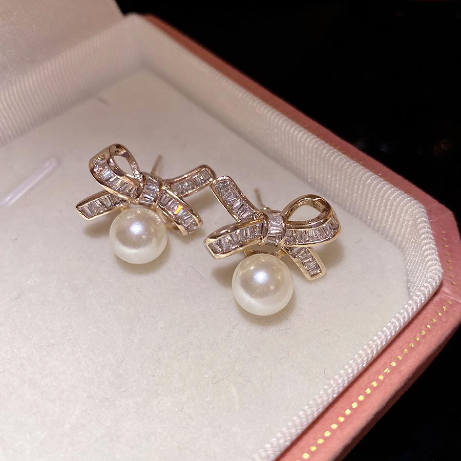 

Silver needle zircon bow pearl stud earrings new popular fashion personalized earrings light luxury high-end earrings