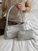 Elegant French Woven Pattern Baguette Women's Shoulder Bag 2026