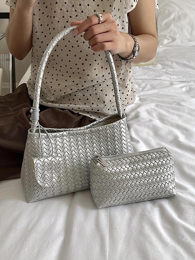 Elegant French Woven Pattern Baguette Women's Shoulder Bag 2026