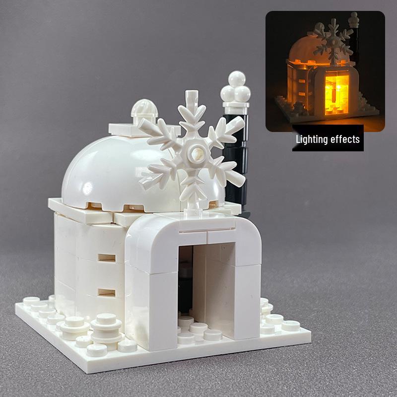 Beleuchtetes arktisches Tier-Baustein-Set: Pinguin, Eisbär, Husky & Wolf Iglu.