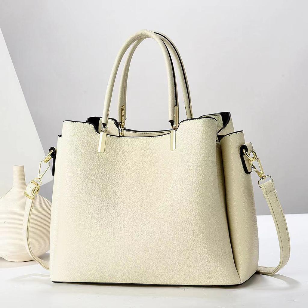 Nova bolsa de luxo leve feminina retrô simples com um único ombro oblíquo cruzado textura estilo estrangeiro bolsa de princesa