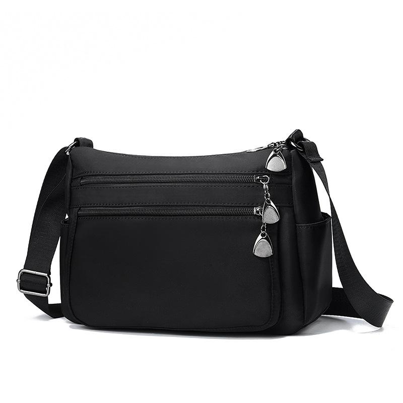 

Новая нейлоновая женская сумка-мессенджер, парусиновая водонепроницаемая большая вместительная портативная сумка через плечо, модная сумка для мам 27*11*19 чёрный