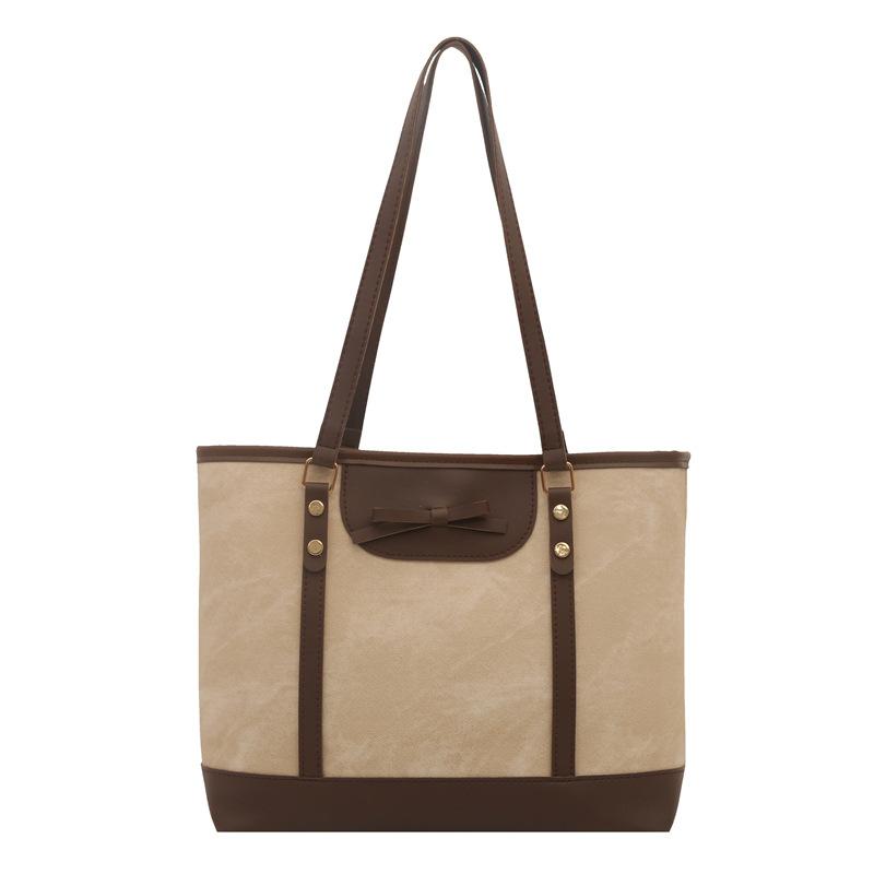 Fashion commuter largecapacity bag women's spring new foreignstyle shoulder bag college student portable tote bag