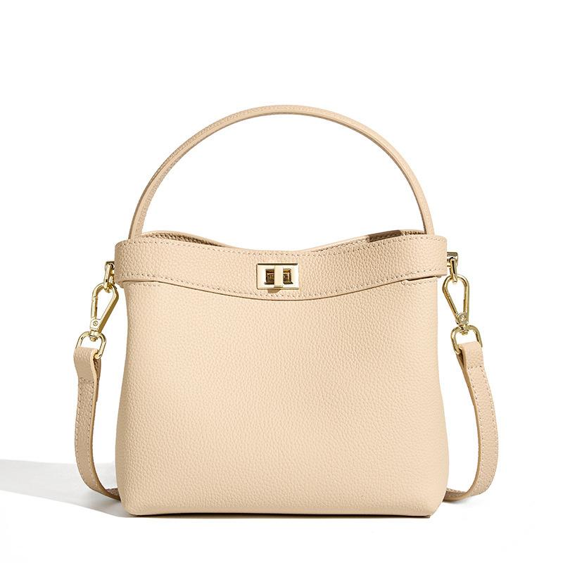 Niche design commuter handbag, high-end genuine leather crossbody bucket bag, single shoulder women's ins-style bucket bag