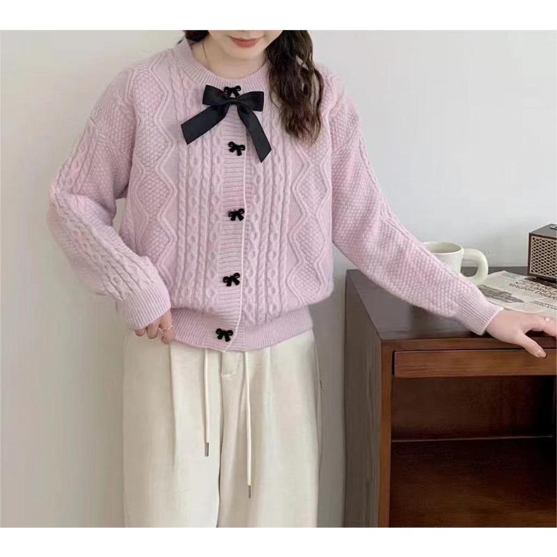 Solid color knitted cardigan women's new autumn and winter bow button with twist sweater jacket
